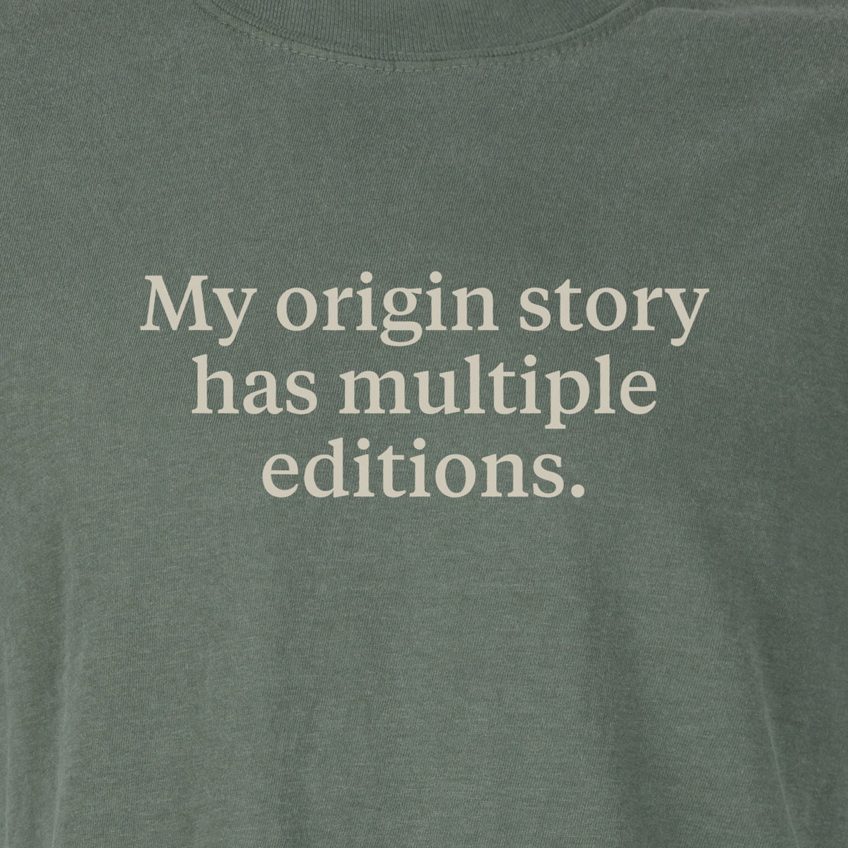 My origin story has multiple editions. | T-shirt